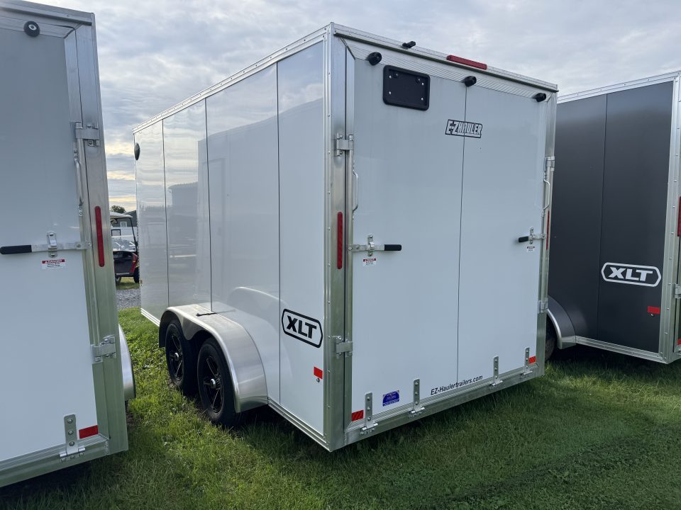 New 2027 E-Z Hauler EZEC7X14 XLT-P Cargo / Enclosed Trailer, 7 FOOT 1 INCH INTERIOR HEIGHT, .080 POLY SIDES, TORSION AXLES, REAR CANOPY, FREE ALUMINUM WHEEL UPGRADE