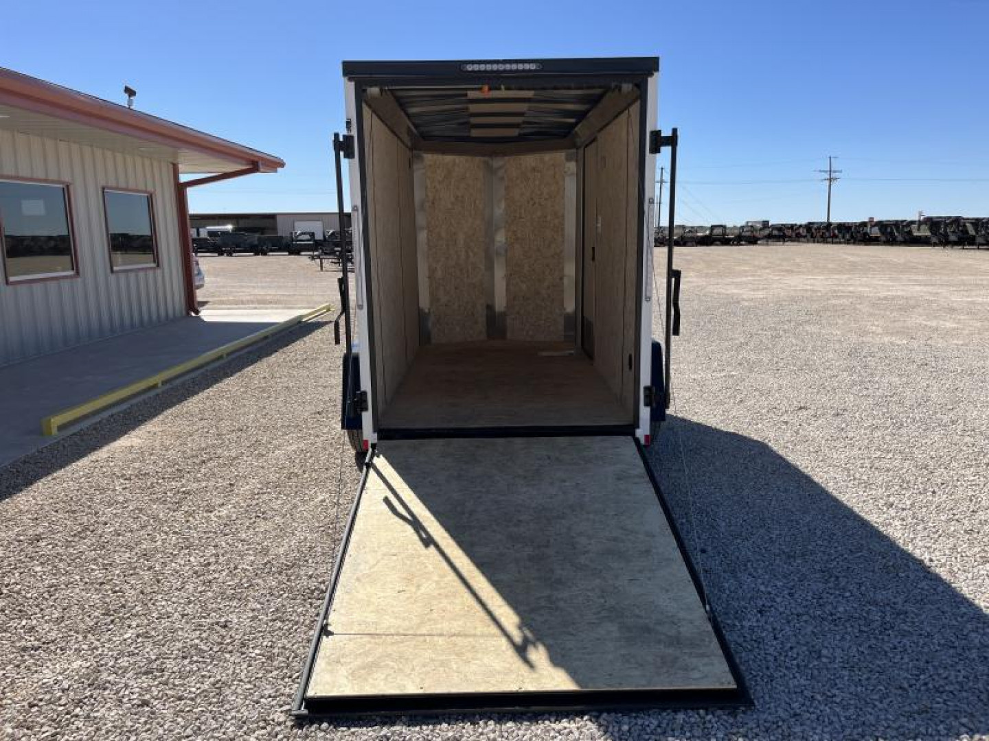 New 2024 Compass 5'x10' Enclosed Cargo Trailer - Indigo DLX