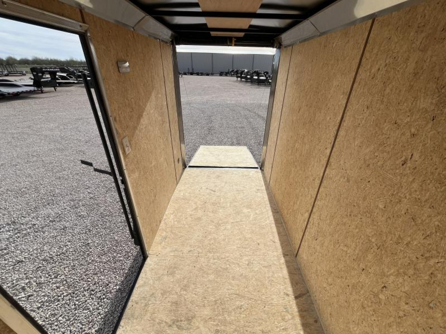 New 2024 Compass 5'x10' Enclosed Cargo Trailer - Indigo DLX