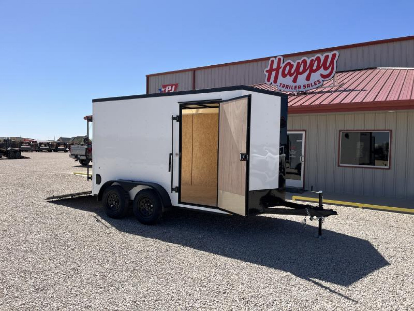 New 2024 Compass 7'x12' Enclosed Cargo Trailer - Indigo DLX