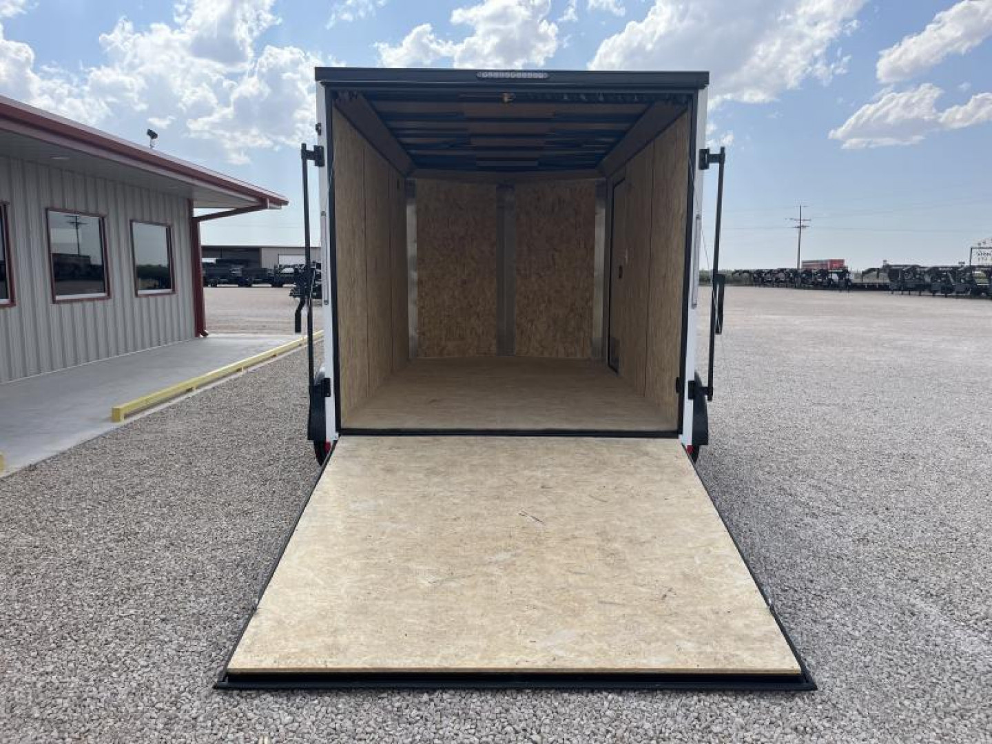 New 2024 Compass 7'x12' Enclosed Cargo Trailer - Indigo DLX