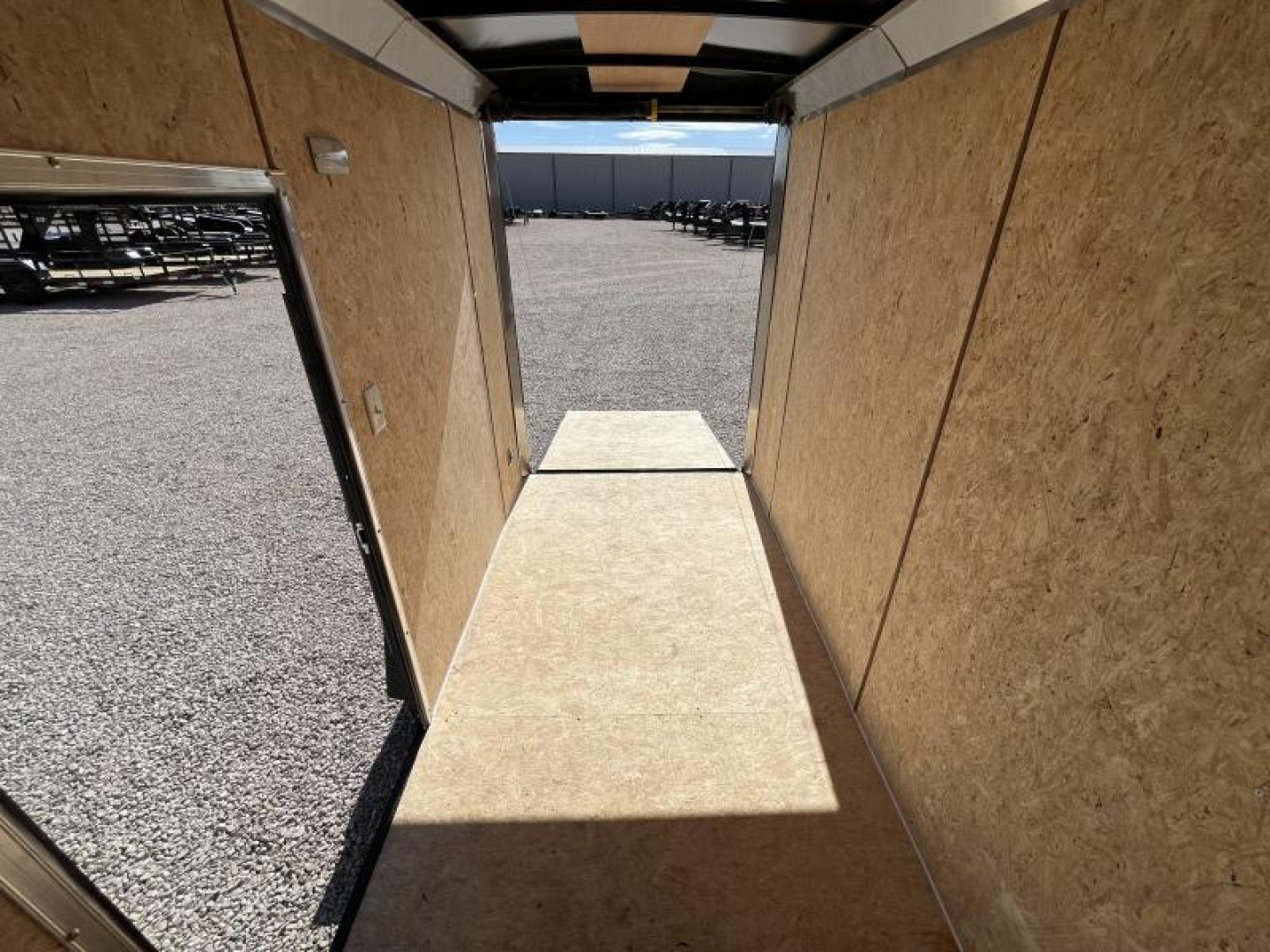 New 2024 Compass 5'x10' Enclosed Cargo Trailer - Indigo DLX