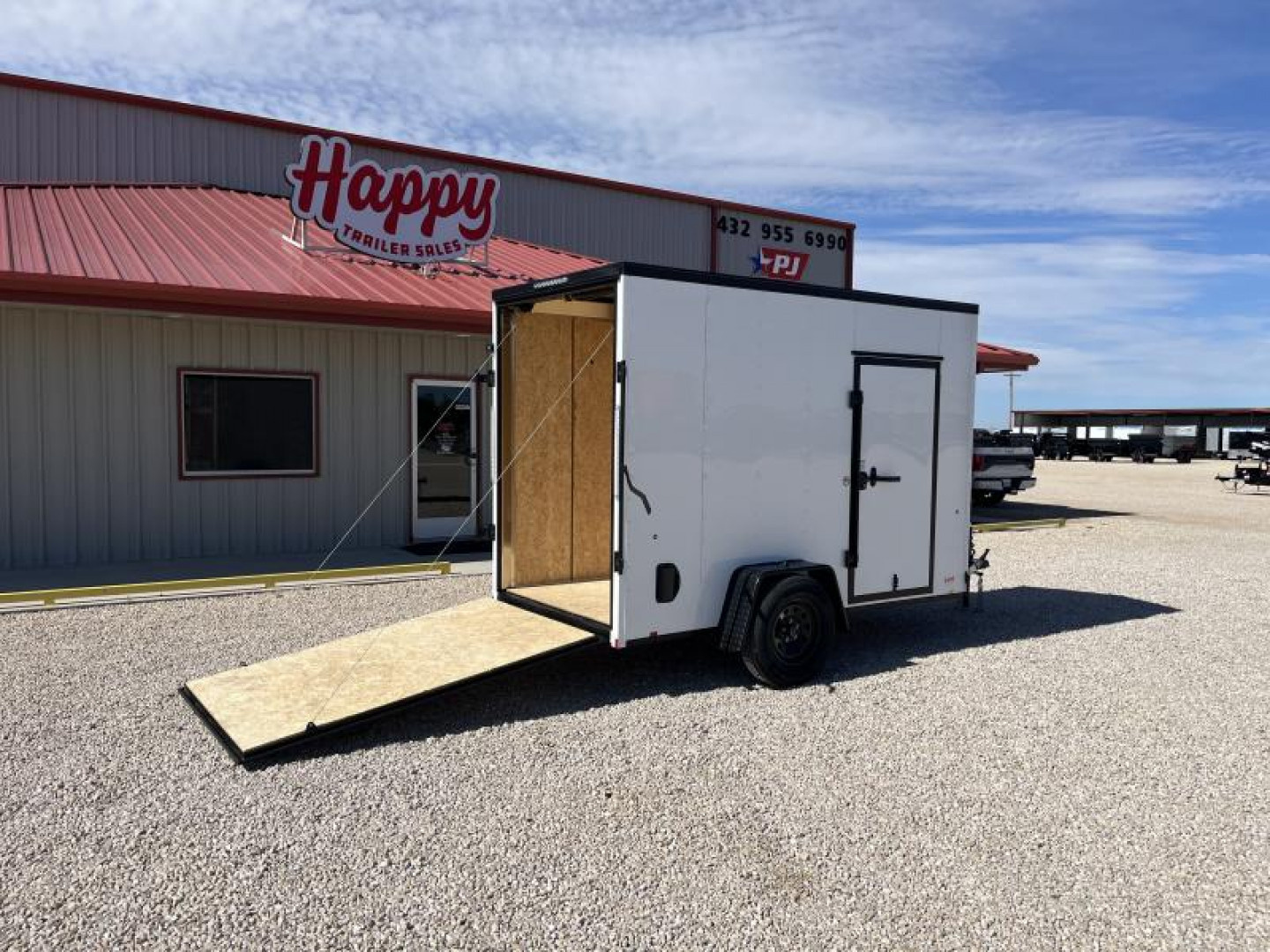 New 2024 Compass 5'x10' Enclosed Cargo Trailer - Indigo DLX