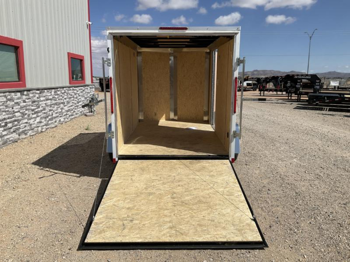 Used *USED* 2025 Compass 6'x10' Enclosed Cargo Trailer - Indigo DLX