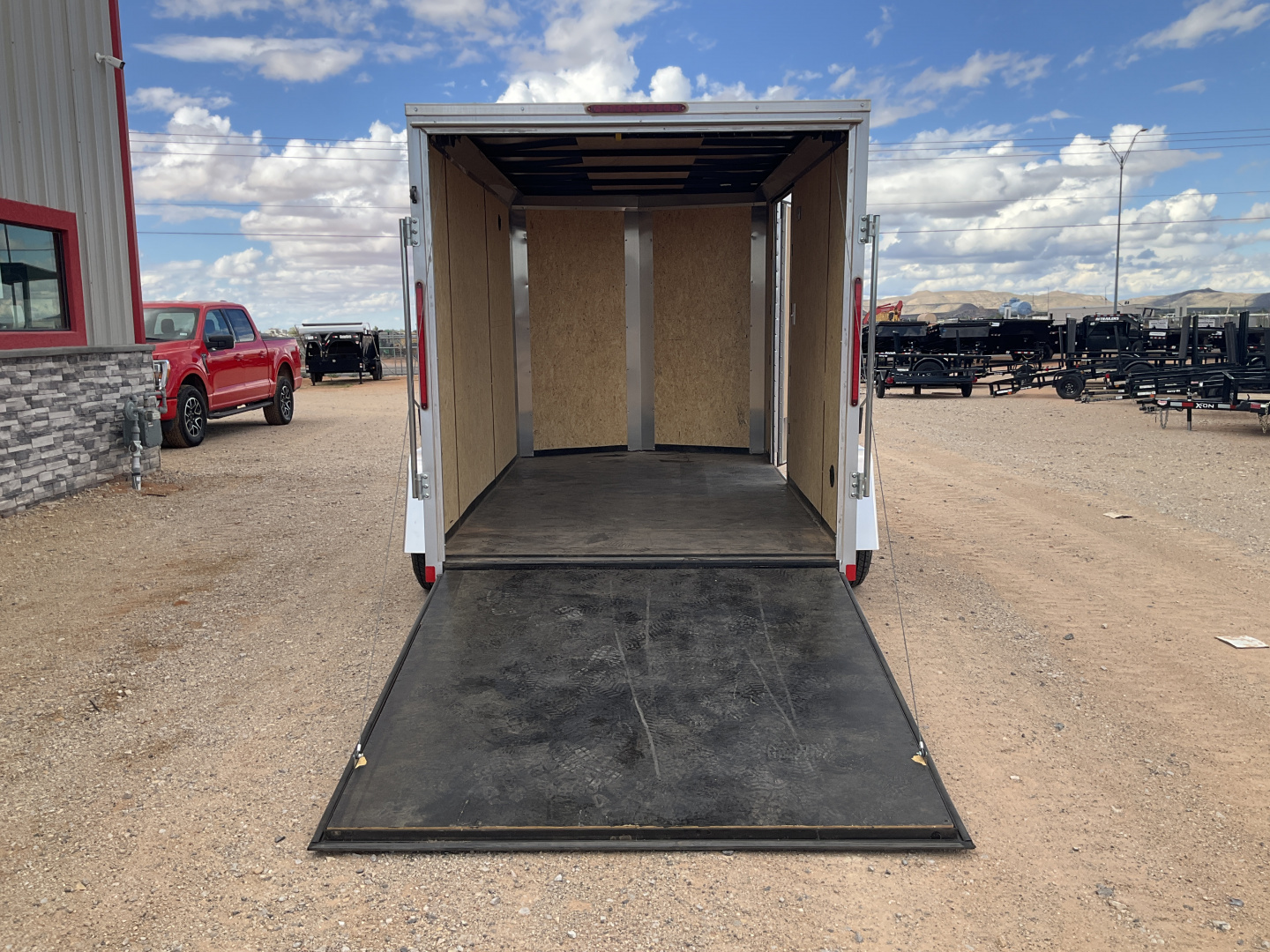 Used 2025 Compass 6'x10' Enclosed Cargo Trailer - Indigo DLX