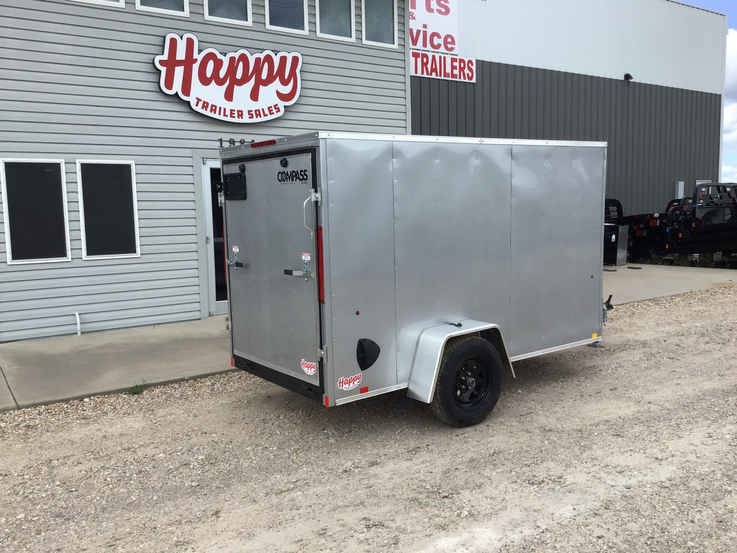 New 2025 Compass 5'x10' Enclosed Cargo Trailer - Indigo DLX