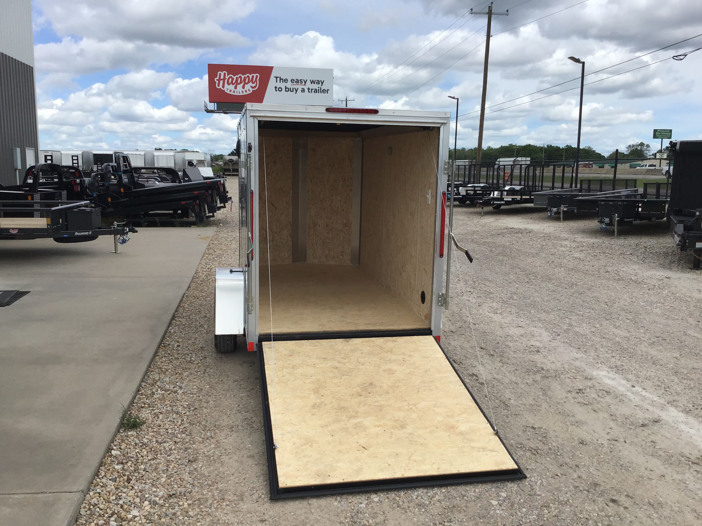 New 2025 Compass 5'x10' Enclosed Cargo Trailer - Indigo DLX