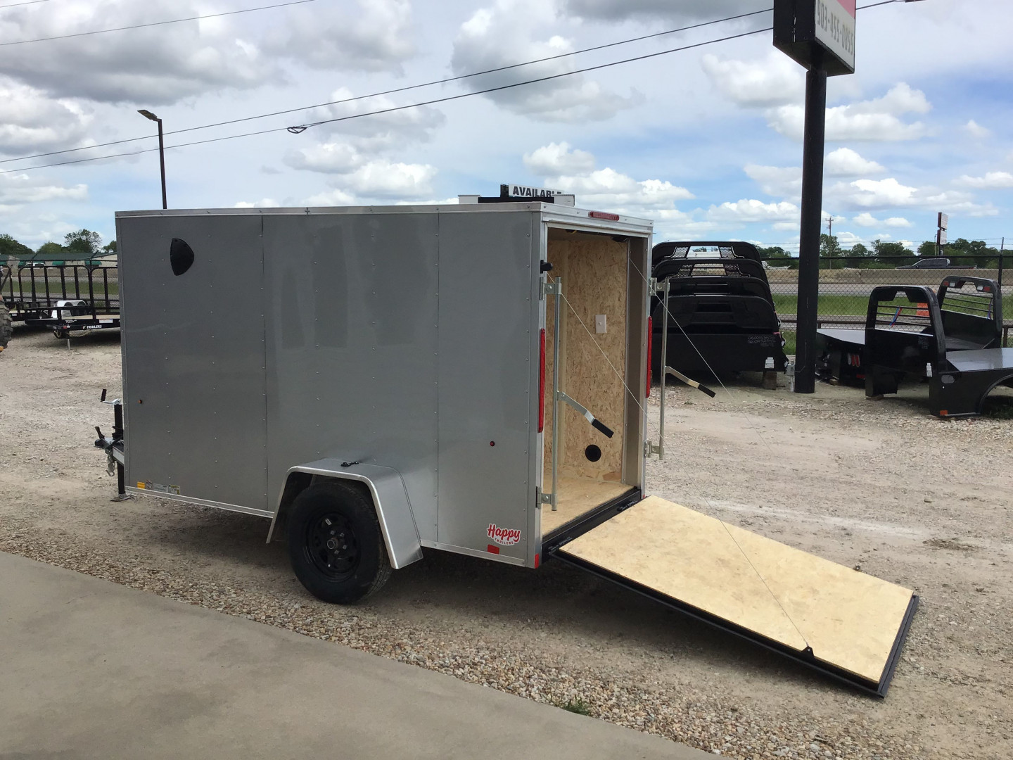 New 2025 Compass 5'x10' Enclosed Cargo Trailer - Indigo DLX