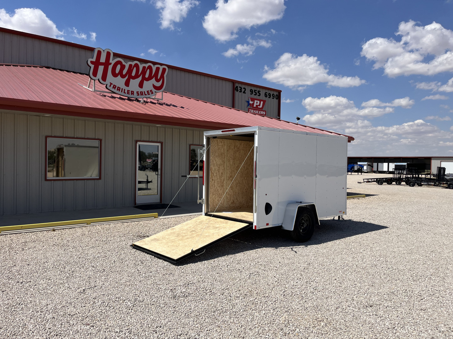 New 2025 Compass 5'x10' Enclosed Cargo Trailer - Indigo DLX