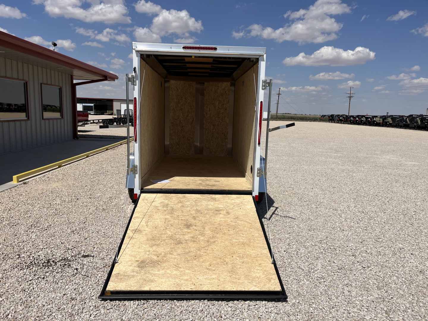 New 2025 Compass 5'x10' Enclosed Cargo Trailer - Indigo DLX