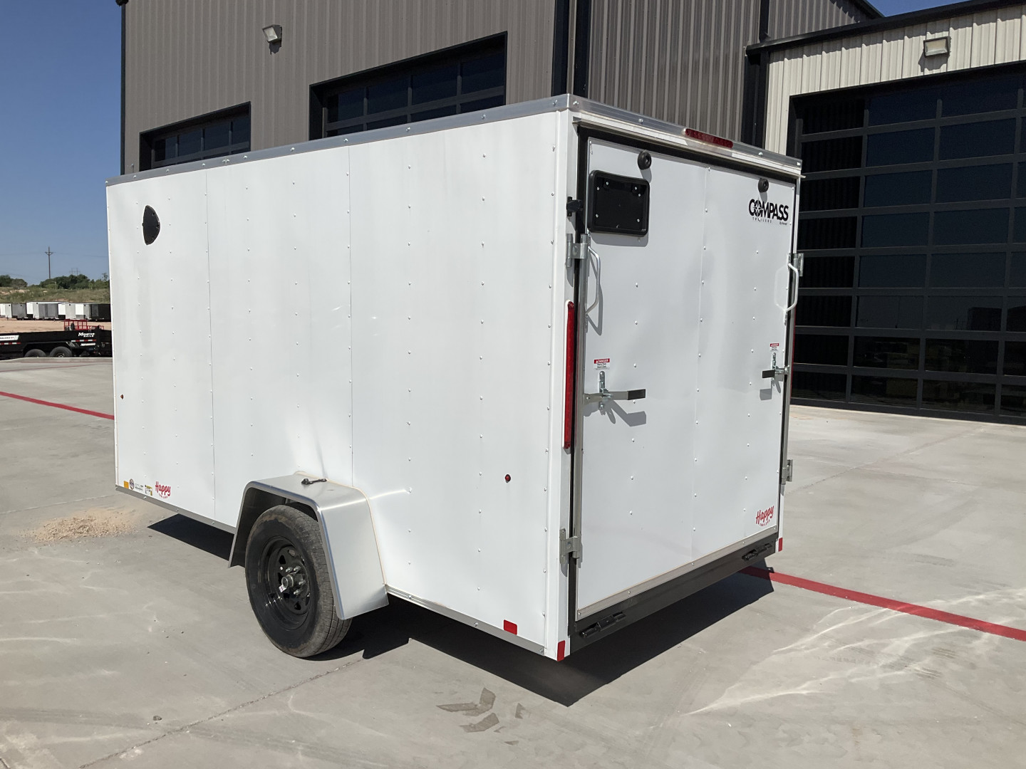 New 2025 Compass 6'x12' Enclosed Cargo Trailer - Indigo DLX