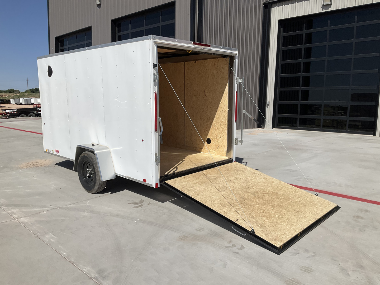 New 2025 Compass 6'x12' Enclosed Cargo Trailer - Indigo DLX