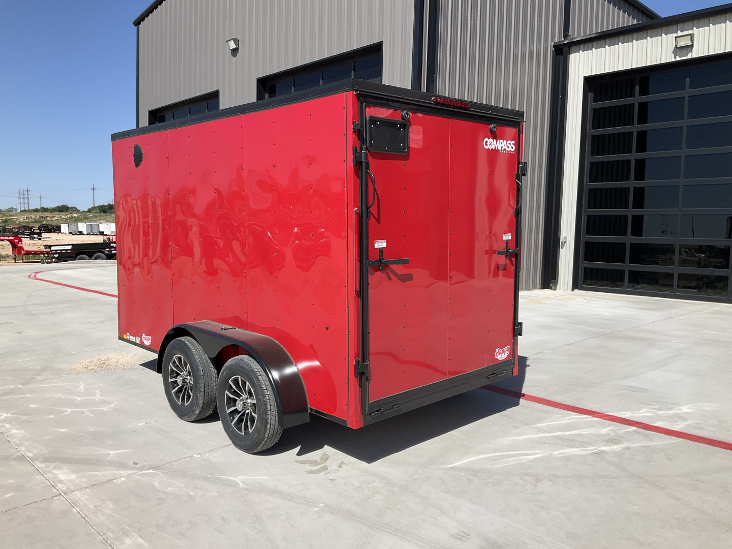 New 2025 Compass 6'x12' Enclosed Cargo Trailer - Indigo DLX