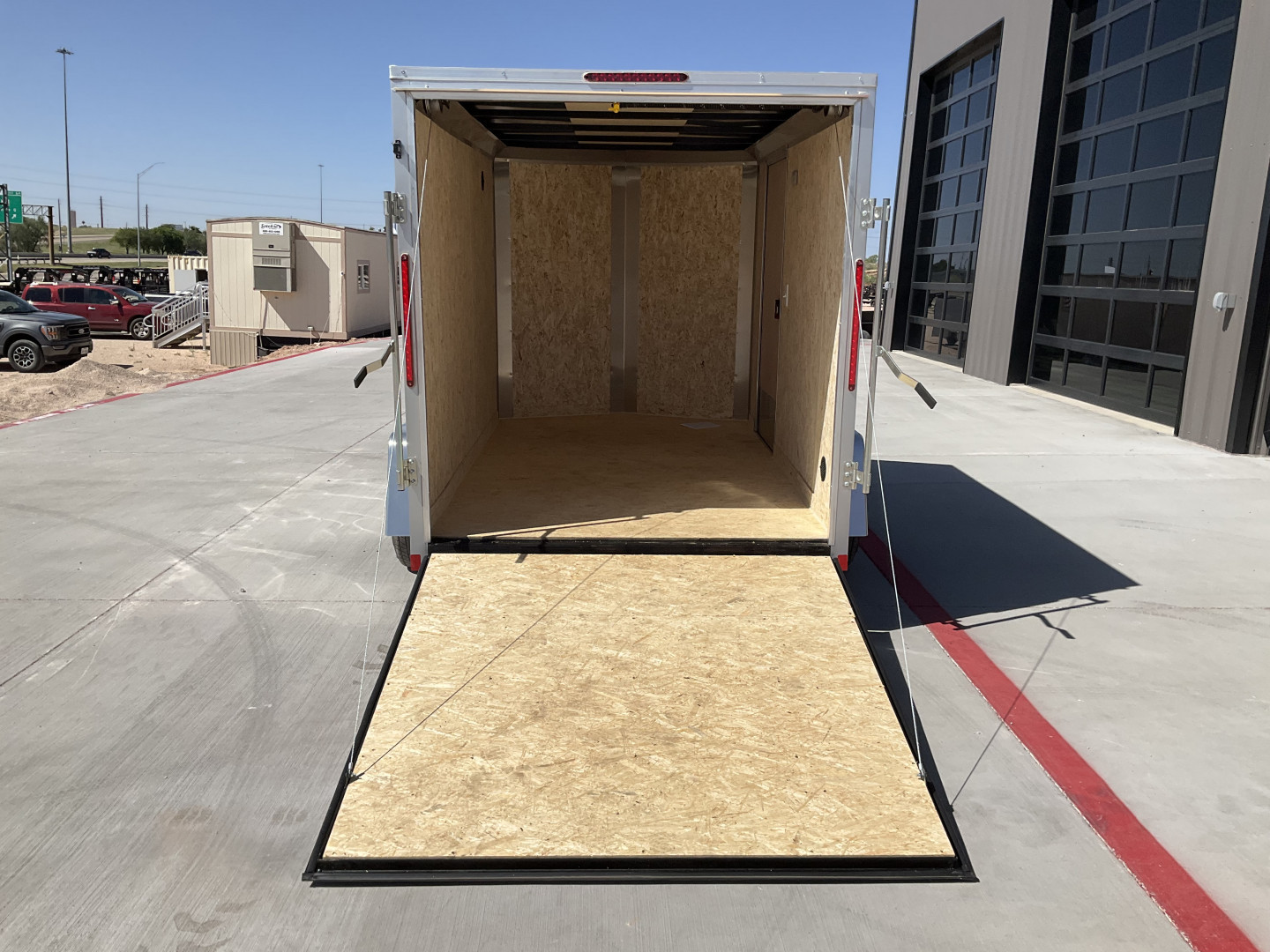 New 2025 Compass 6'x10' Enclosed Cargo Trailer - Indigo DLX