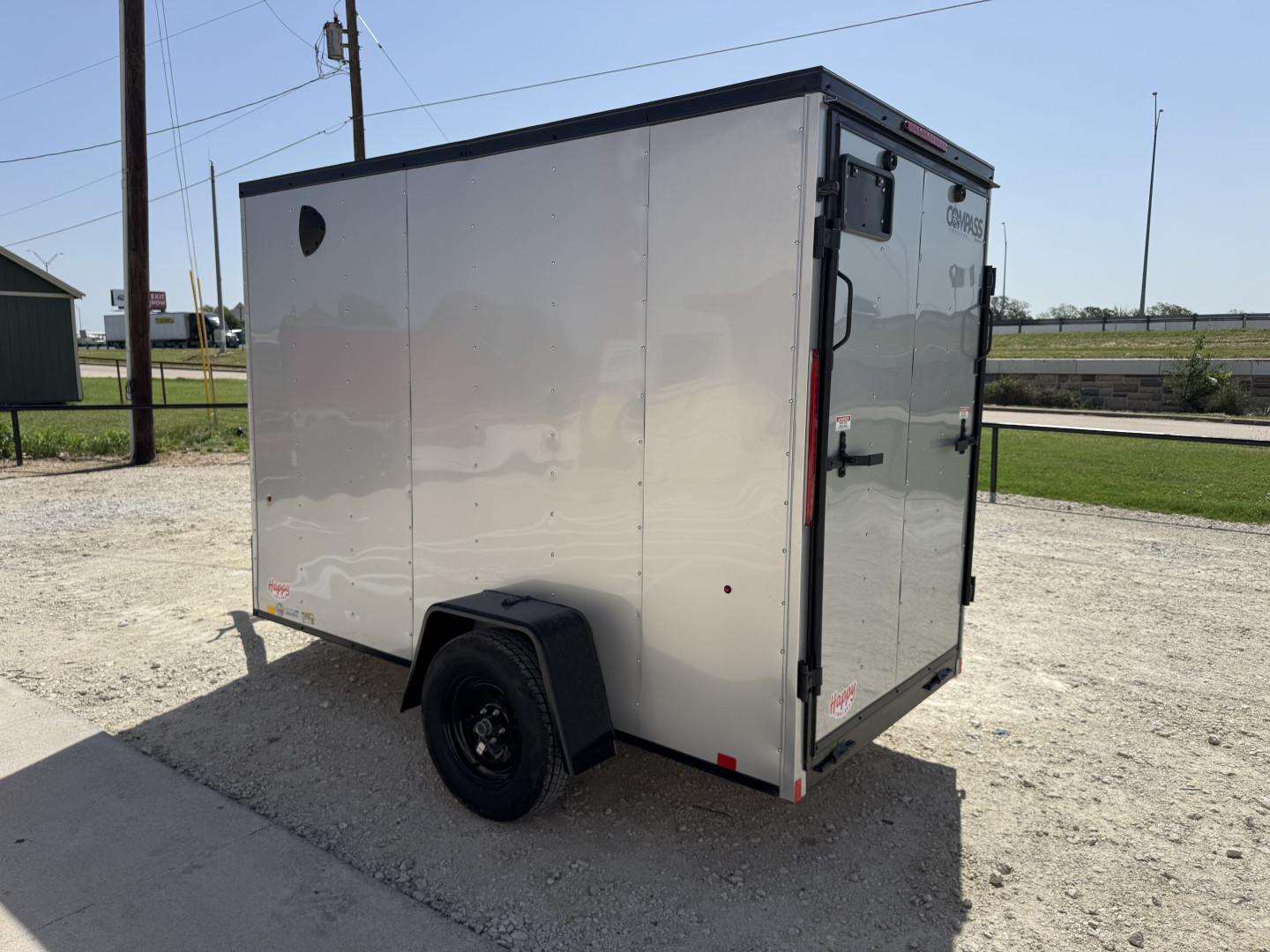 New 2025 Compass 5'x10' Enclosed Cargo Trailer - Indigo DLX