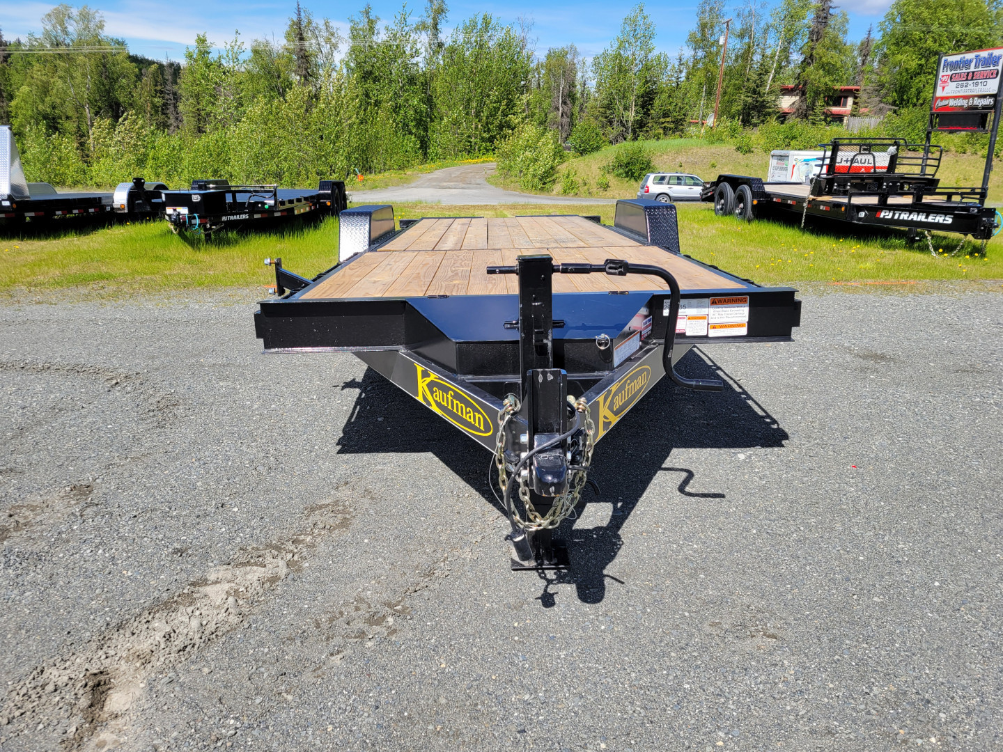 New 2025 Kaufman Trailers Deluxe Equipment Tilt Trailer