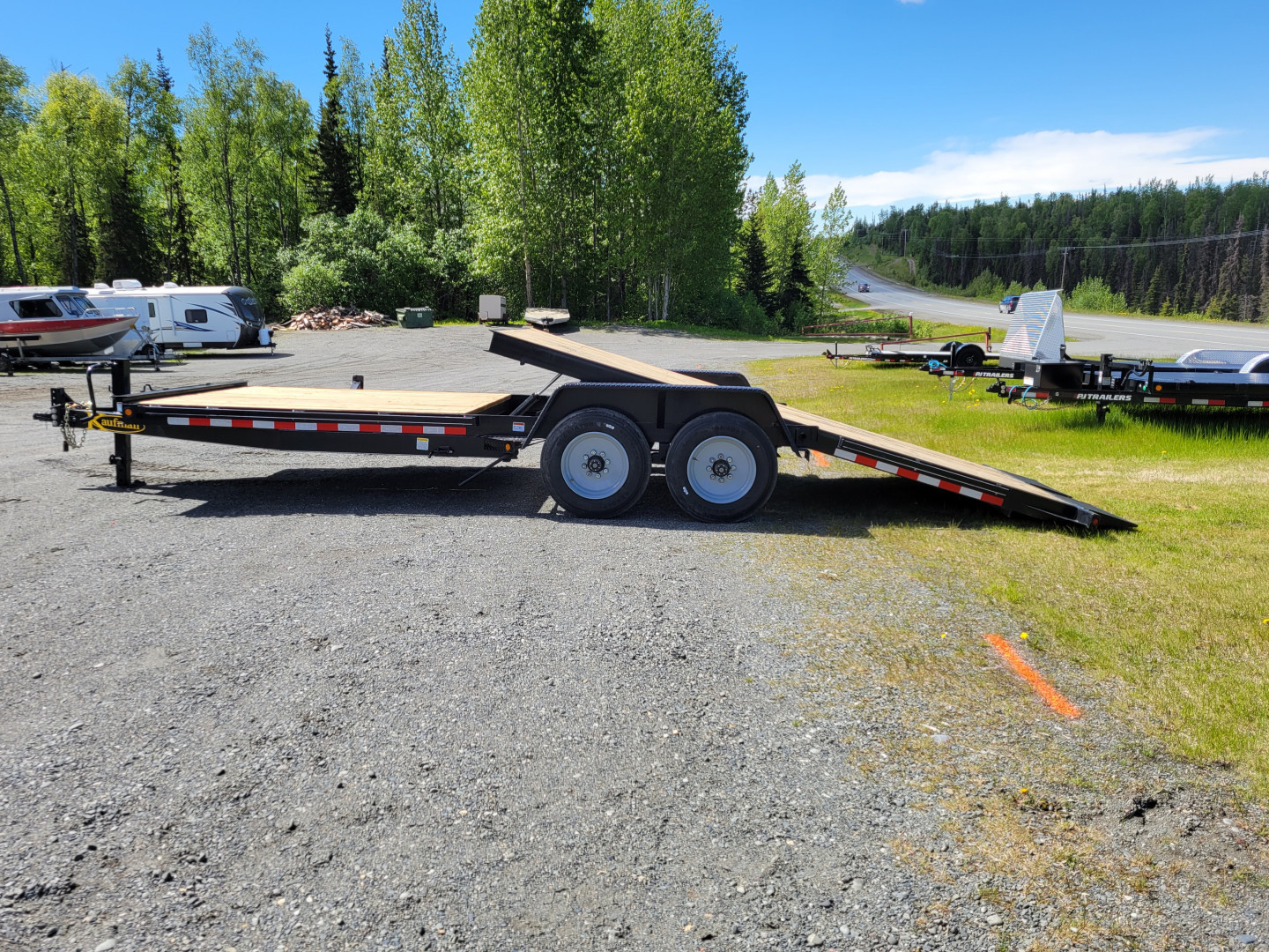 New 2025 Kaufman Trailers Deluxe Equipment Tilt Trailer