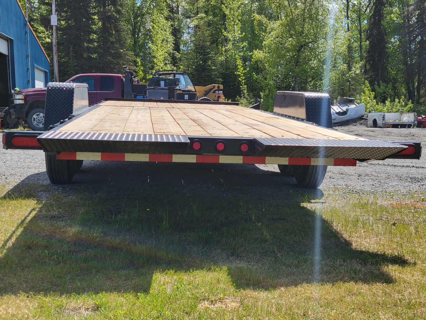 New 2025 Kaufman Trailers Deluxe Equipment Tilt Trailer