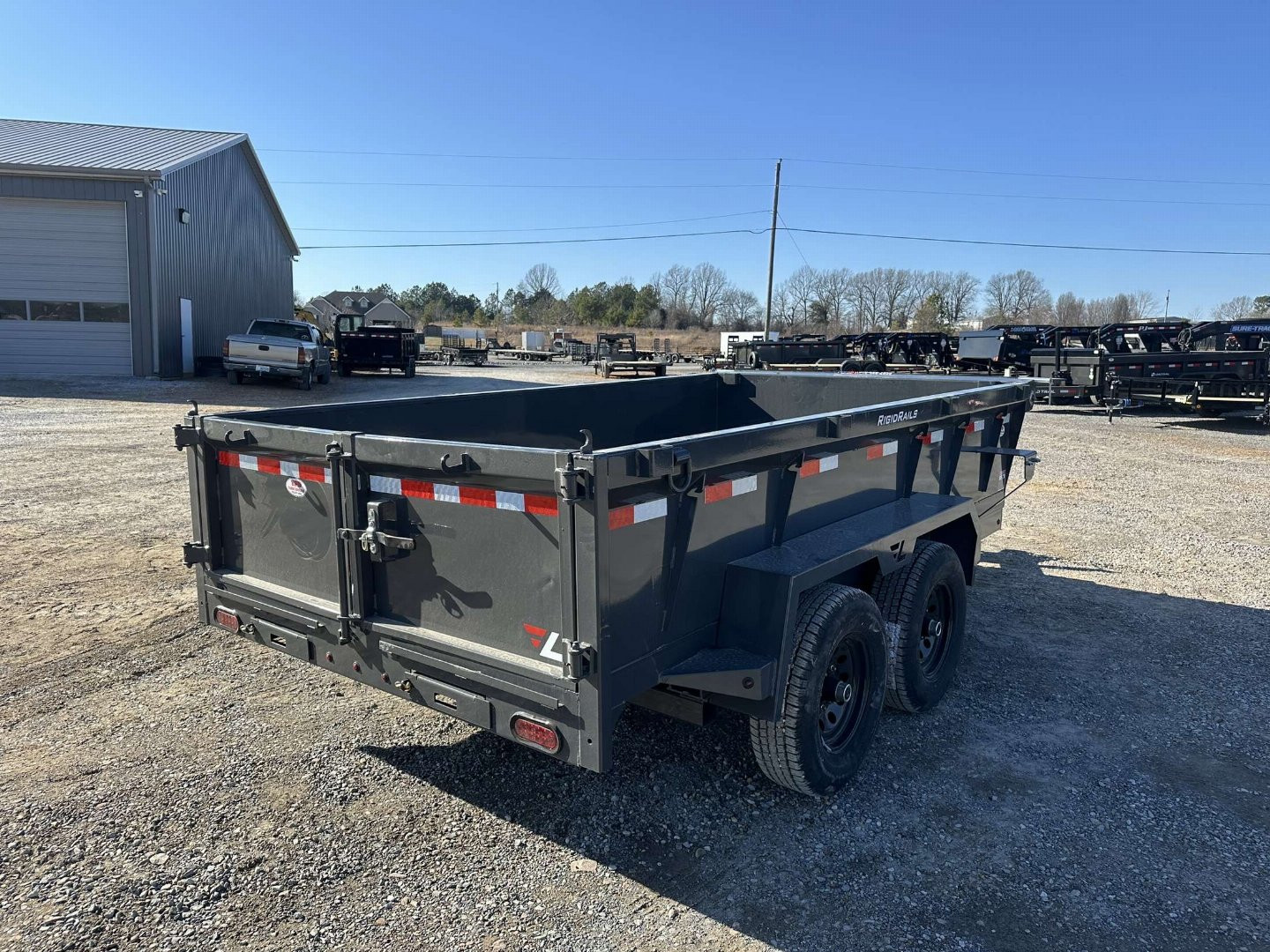 New 2025 Lamar 77"x12' 10k Dump Trailer