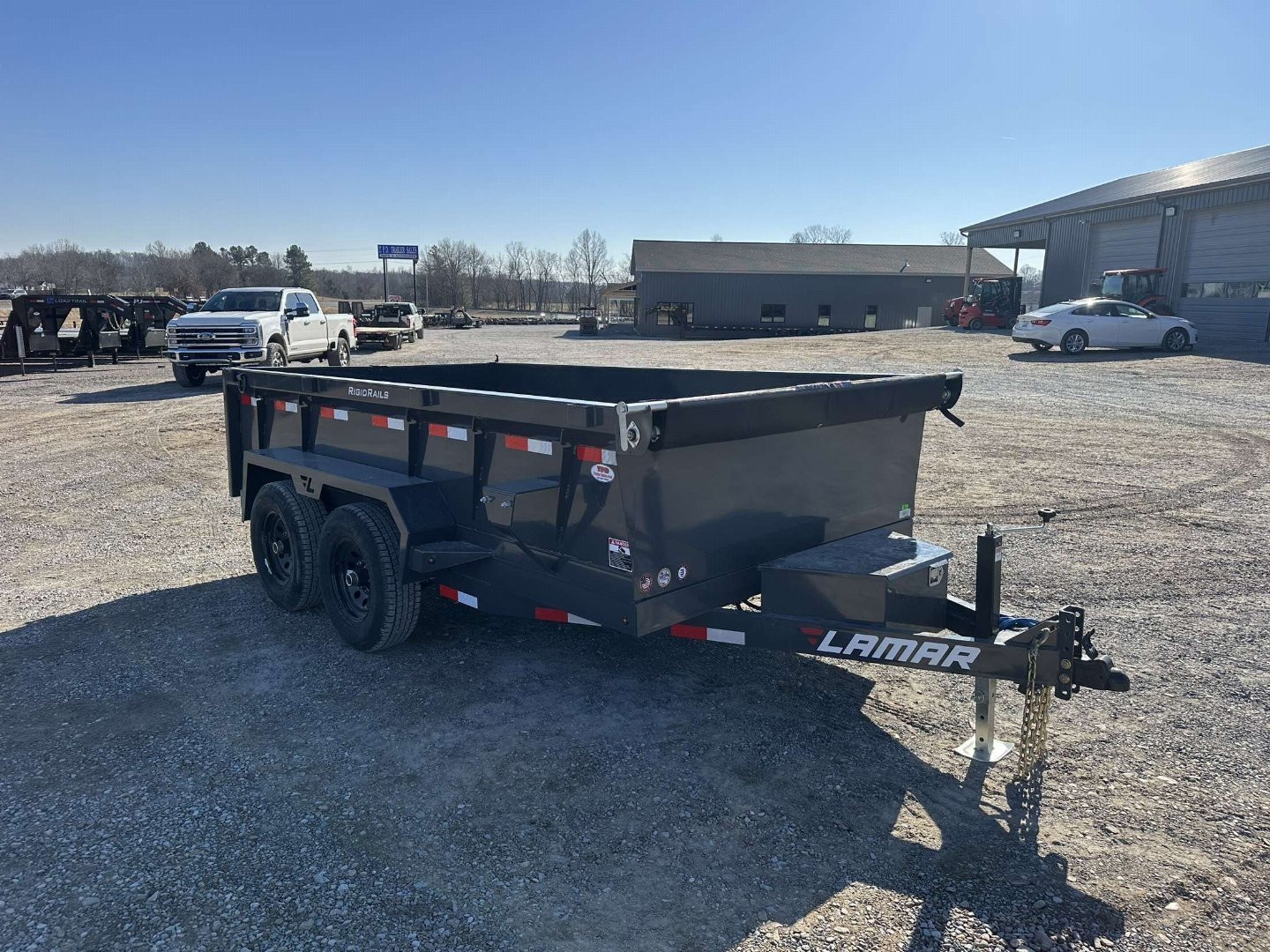 New 2025 Lamar 77"x12' 10k Dump Trailer