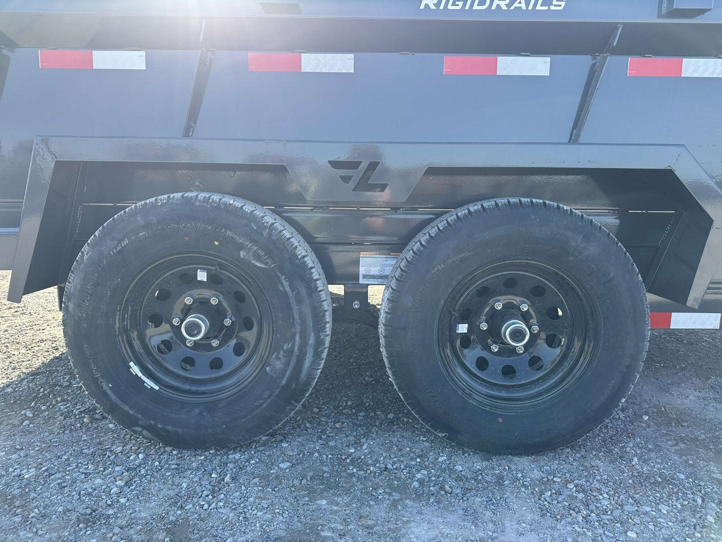 New 2025 Lamar 77"x12' 10k Dump Trailer