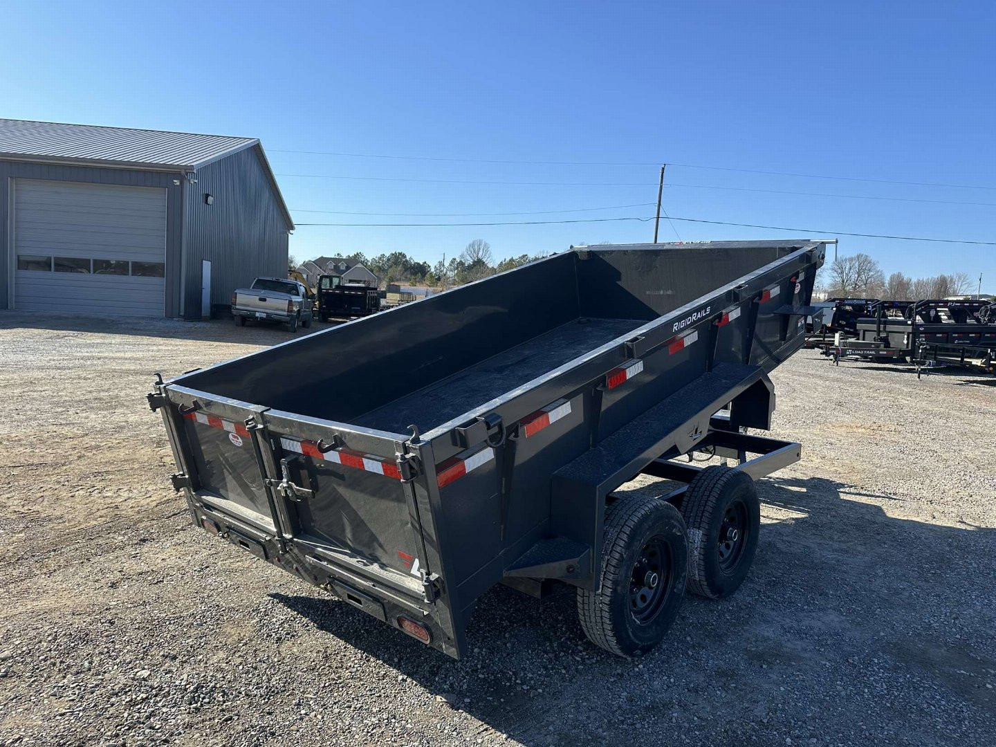 New 2025 Lamar 77"x12' 10k Dump Trailer