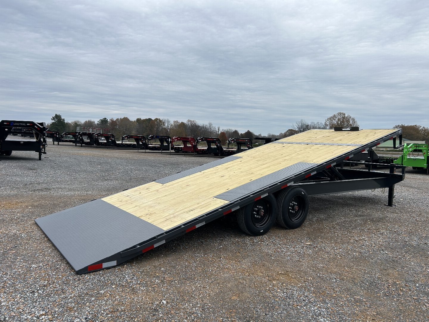 New 2025 Lamar 102"X24' 16K Deckover Tilt Trailer