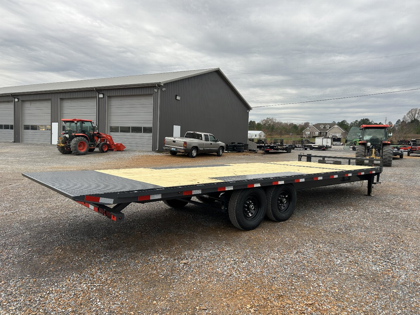 New 2025 Lamar 102"X24' 14K Deckover Tilt Trailer