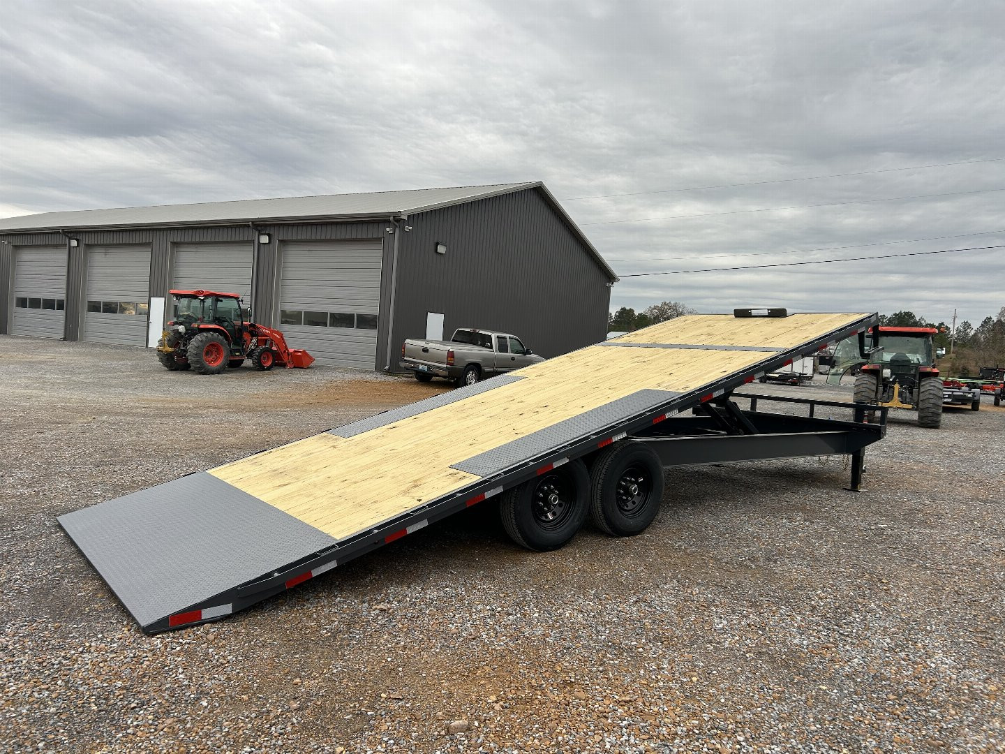 New 2025 Lamar 102"X24' 14K Deckover Tilt Trailer