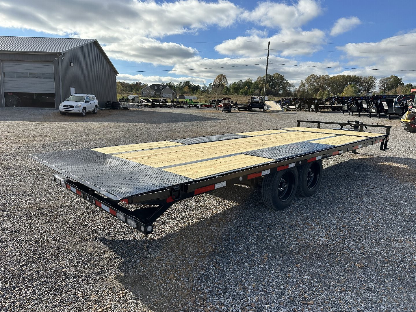 New 2025 MAXXD 102"X24' 17.6K Deckover Gravity Tilt Trailer