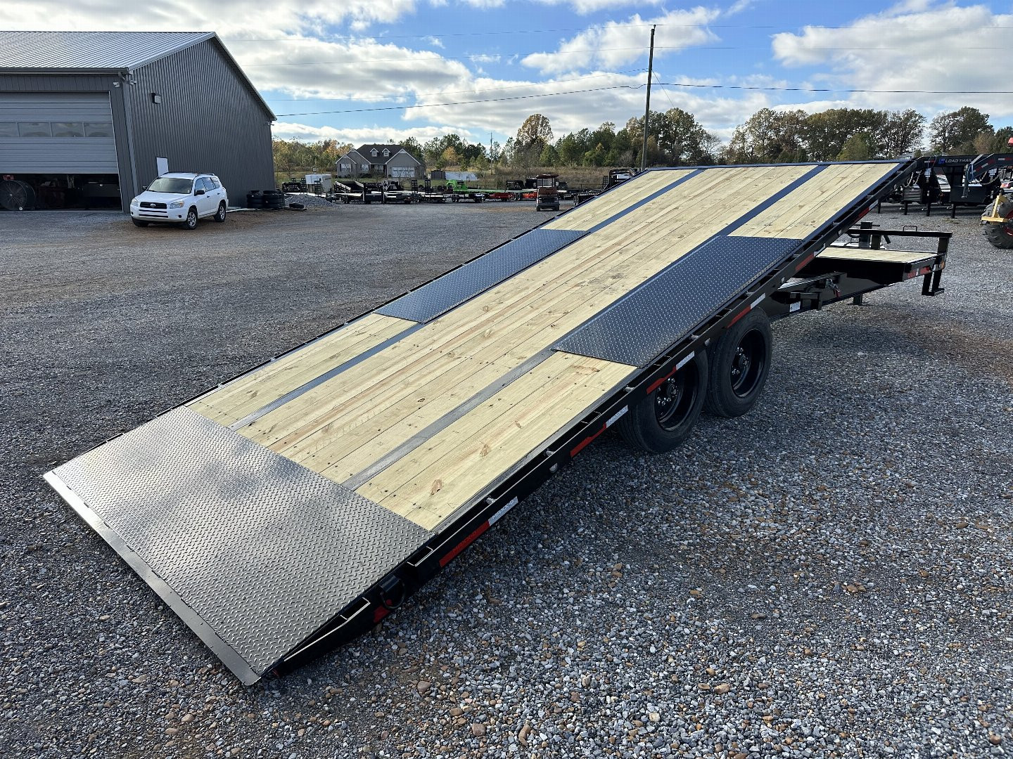 New 2025 MAXXD 102"X24' 17.6K Deckover Gravity Tilt Trailer