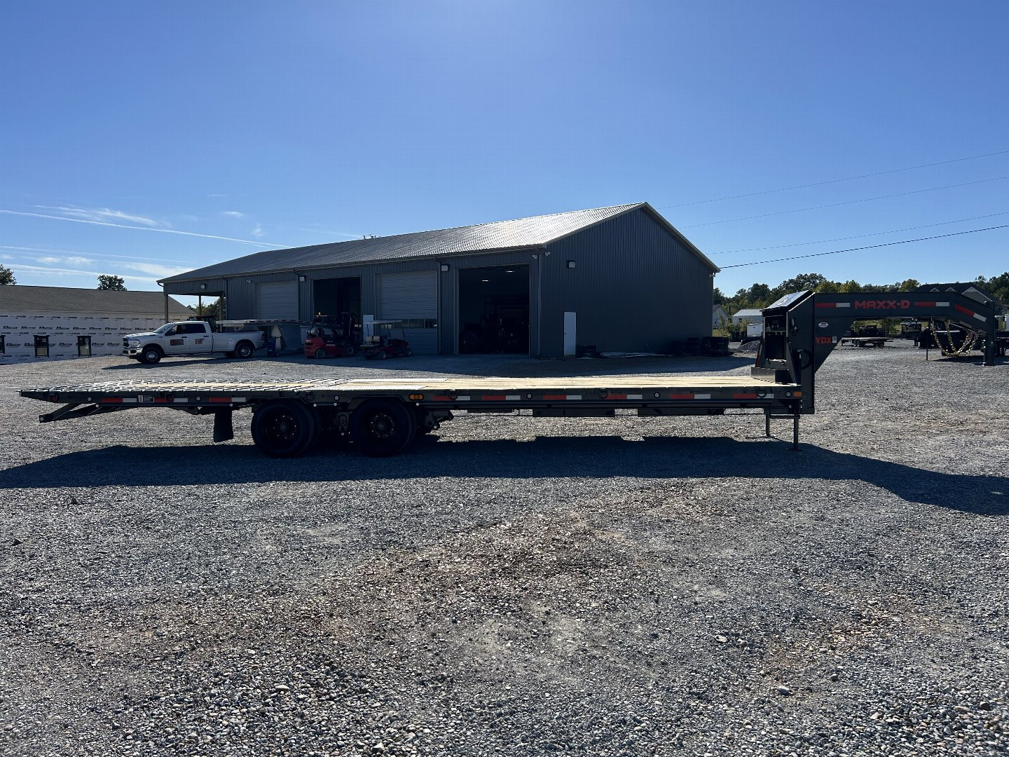 New 2025 MAXXD 32' x 102" 30k Hyd Dove Gooseneck Trailer