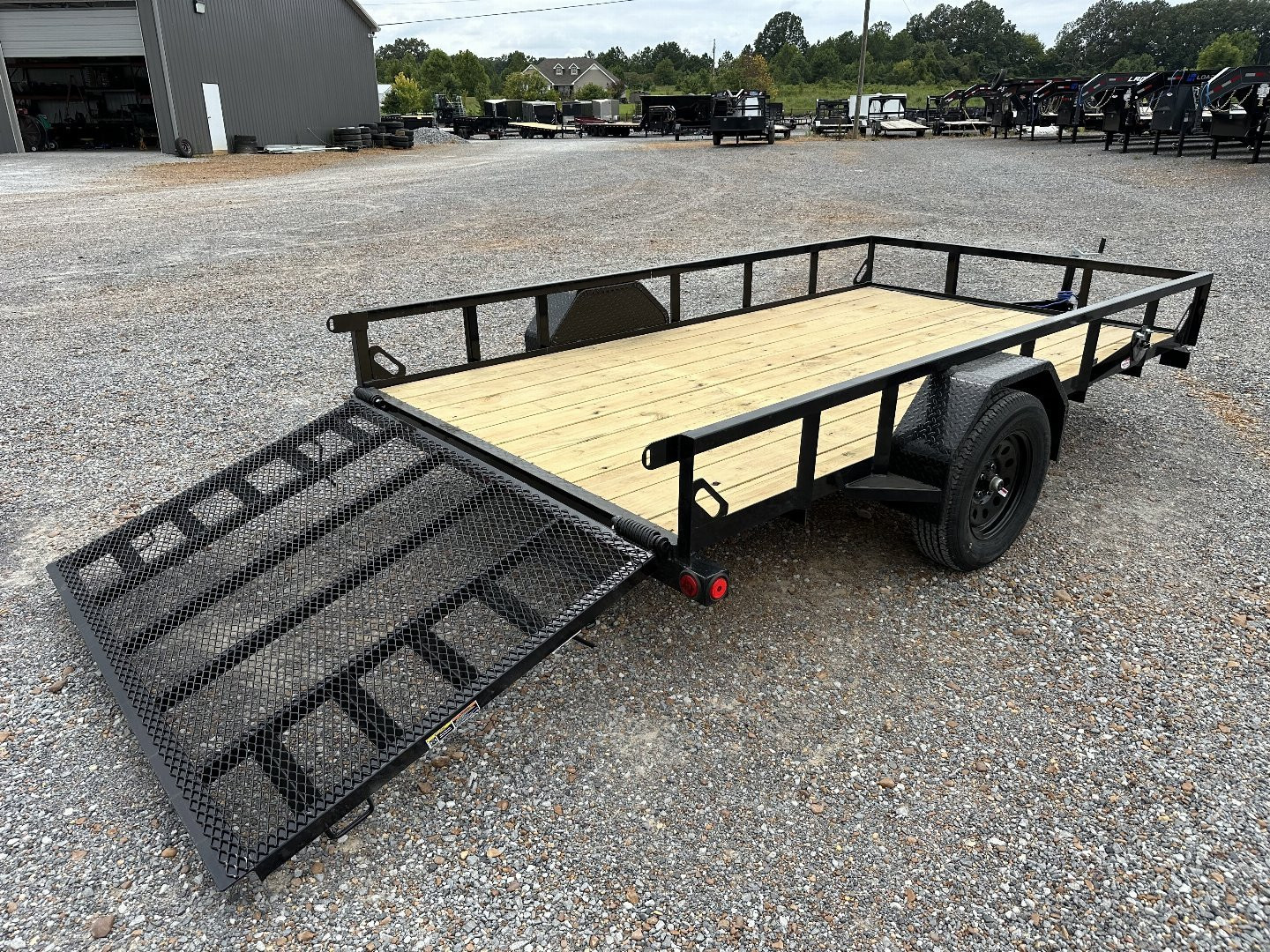 New 2025 LOAD TRAIL 77"x12' 3k Utility Trailer