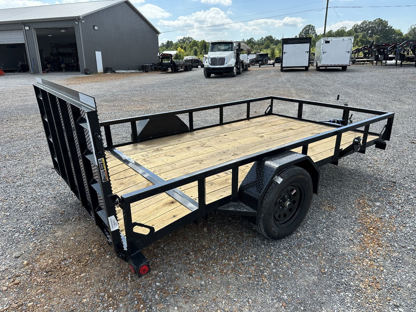 New 2025 LOAD TRAIL 77"x12' 3k Utility Trailer