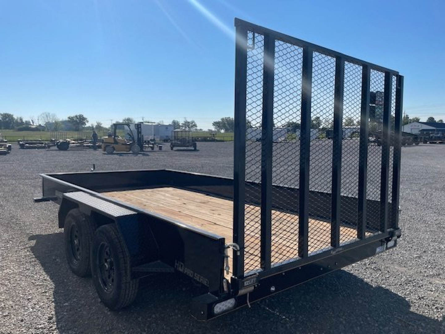 New 2024 DOOLITTLE 84X14 TANDEM AXLE UTILITY W/5' GATE, 15" WALLS