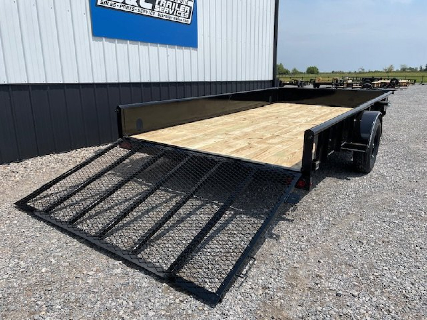 New 2024 DAVIDSON 83X12 PIPE TOP (1)SINGLE AXLE UTILITY W/4' GATE, 15" SOLID STEEL WALLS