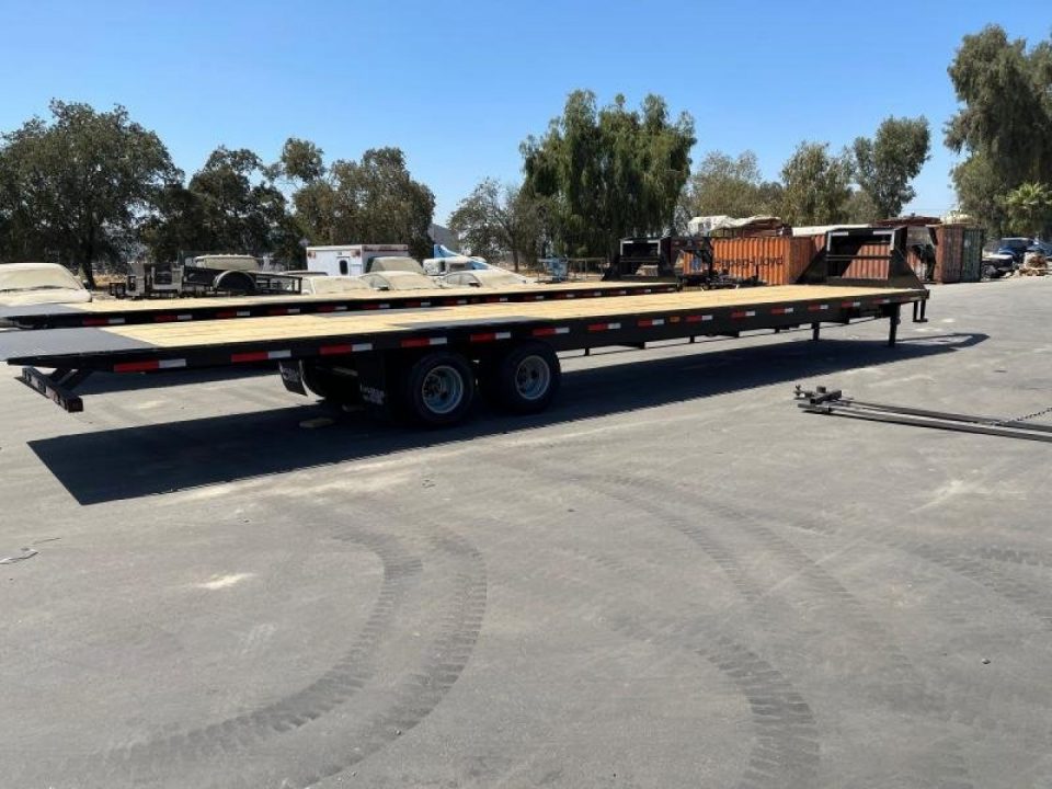 New 2021 East Texas Trailers GE0240102 Flatbed Trailer
