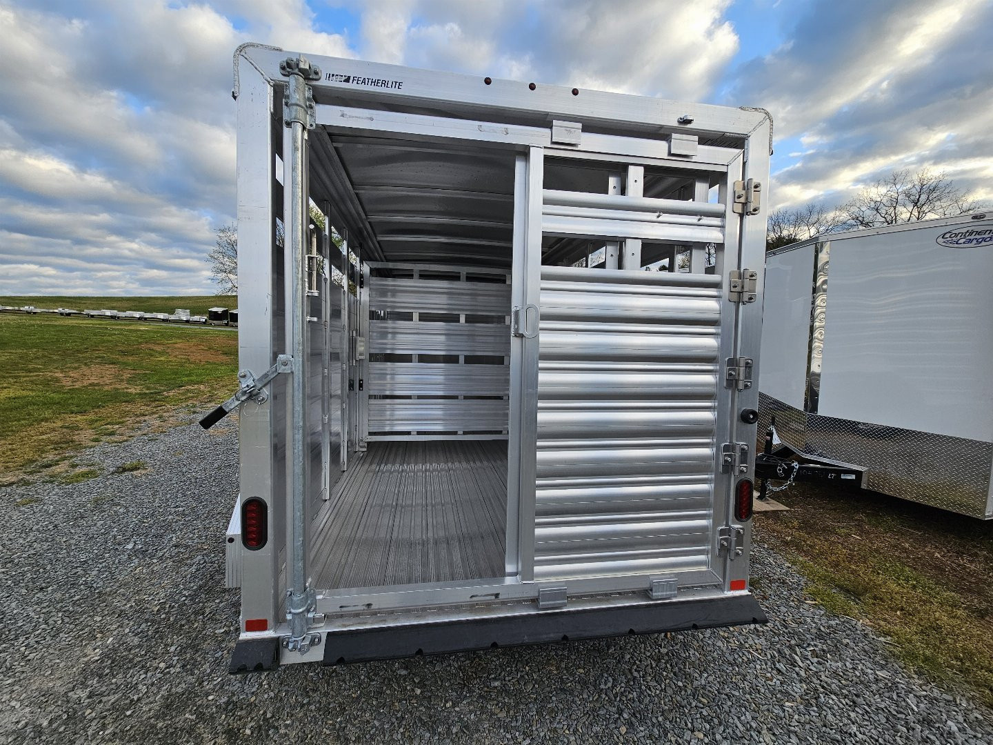 New 2025 Featherlite Trailers 8117 6'7"X16' Stock / Stock Combo Trailer