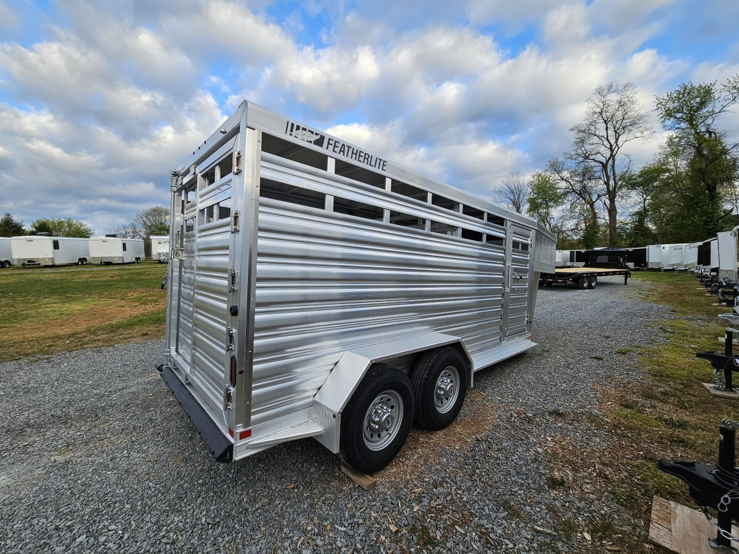New 2025 Featherlite Trailers 8117 6'7"X16' Stock / Stock Combo Trailer