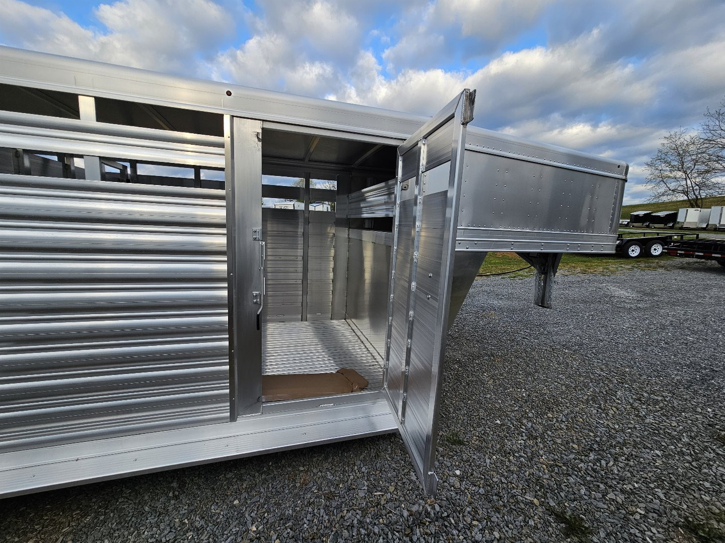 New 2025 Featherlite Trailers 8117 6'7"X16' Stock / Stock Combo Trailer