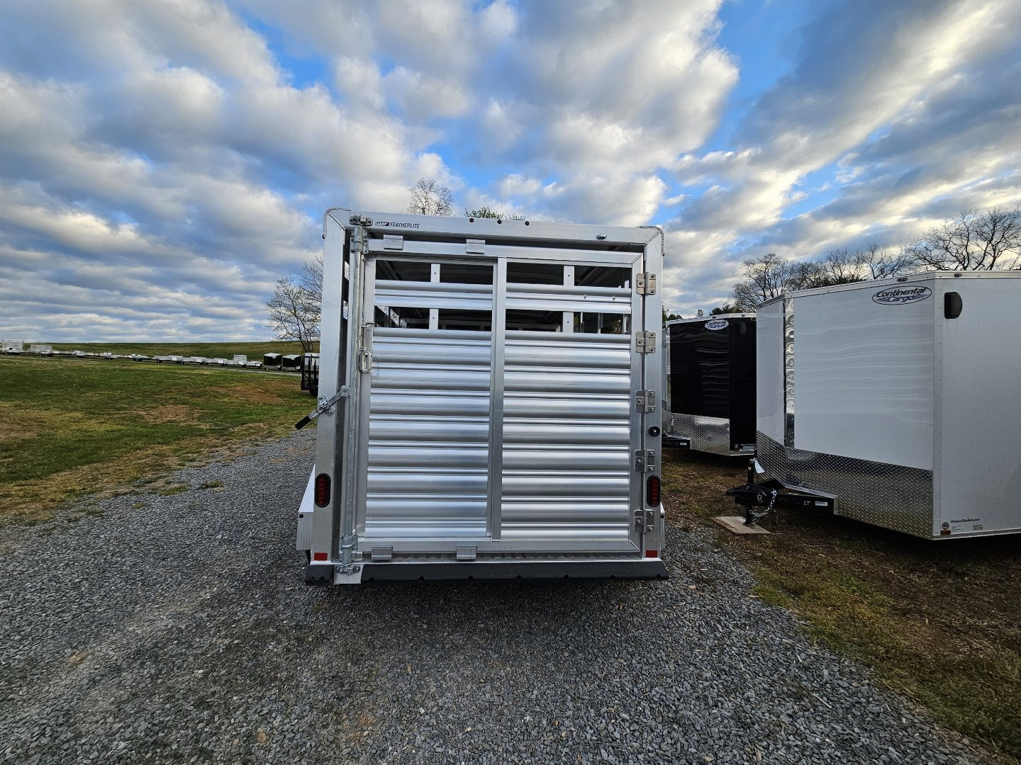 New 2025 Featherlite Trailers 8117 6'7"X16' Stock / Stock Combo Trailer