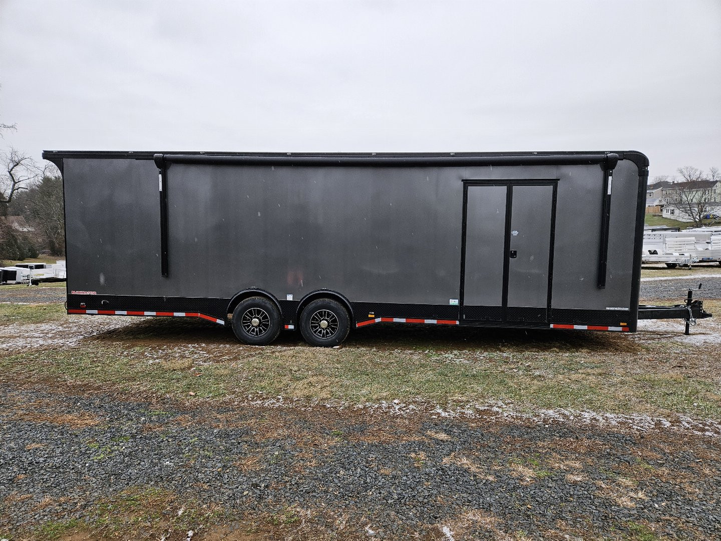 New 2025 Cargo Mate ELIMINATOR 8.5X28TA Car / Racing Trailer