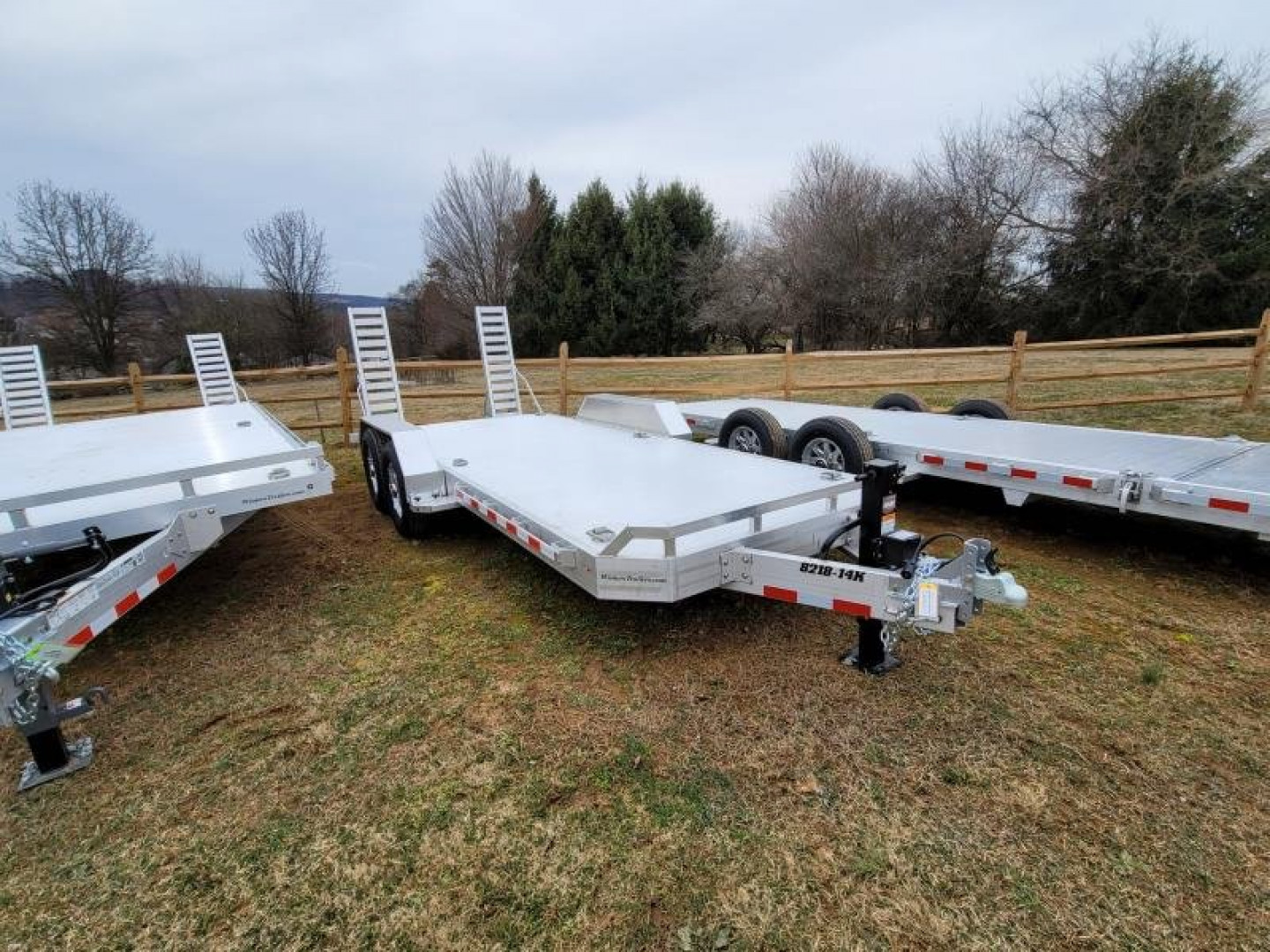 New 2024 Aluma 82x18 SKID STEER Equipment Trailer