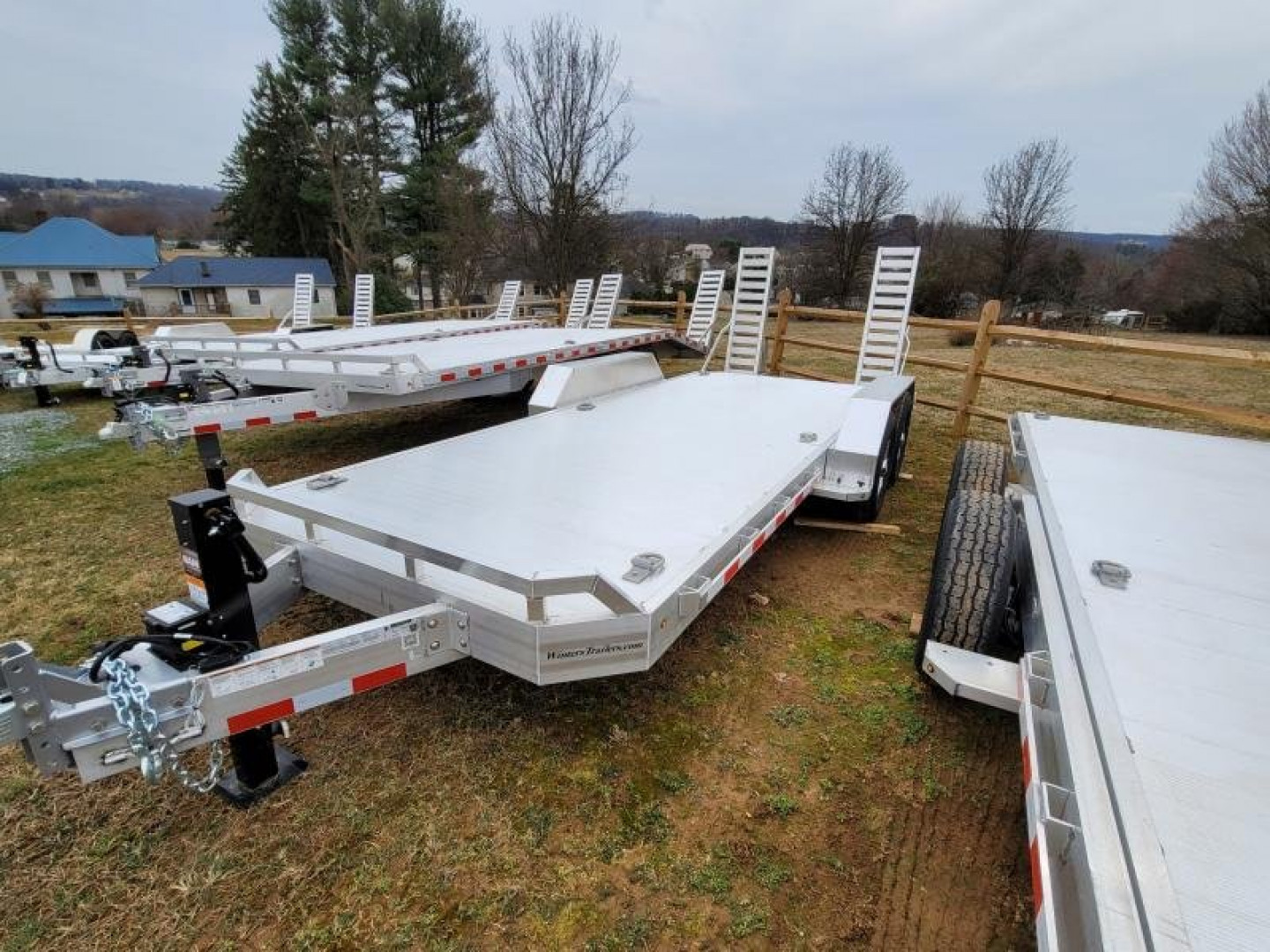 New 2024 Aluma 82x18 SKID STEER Equipment Trailer