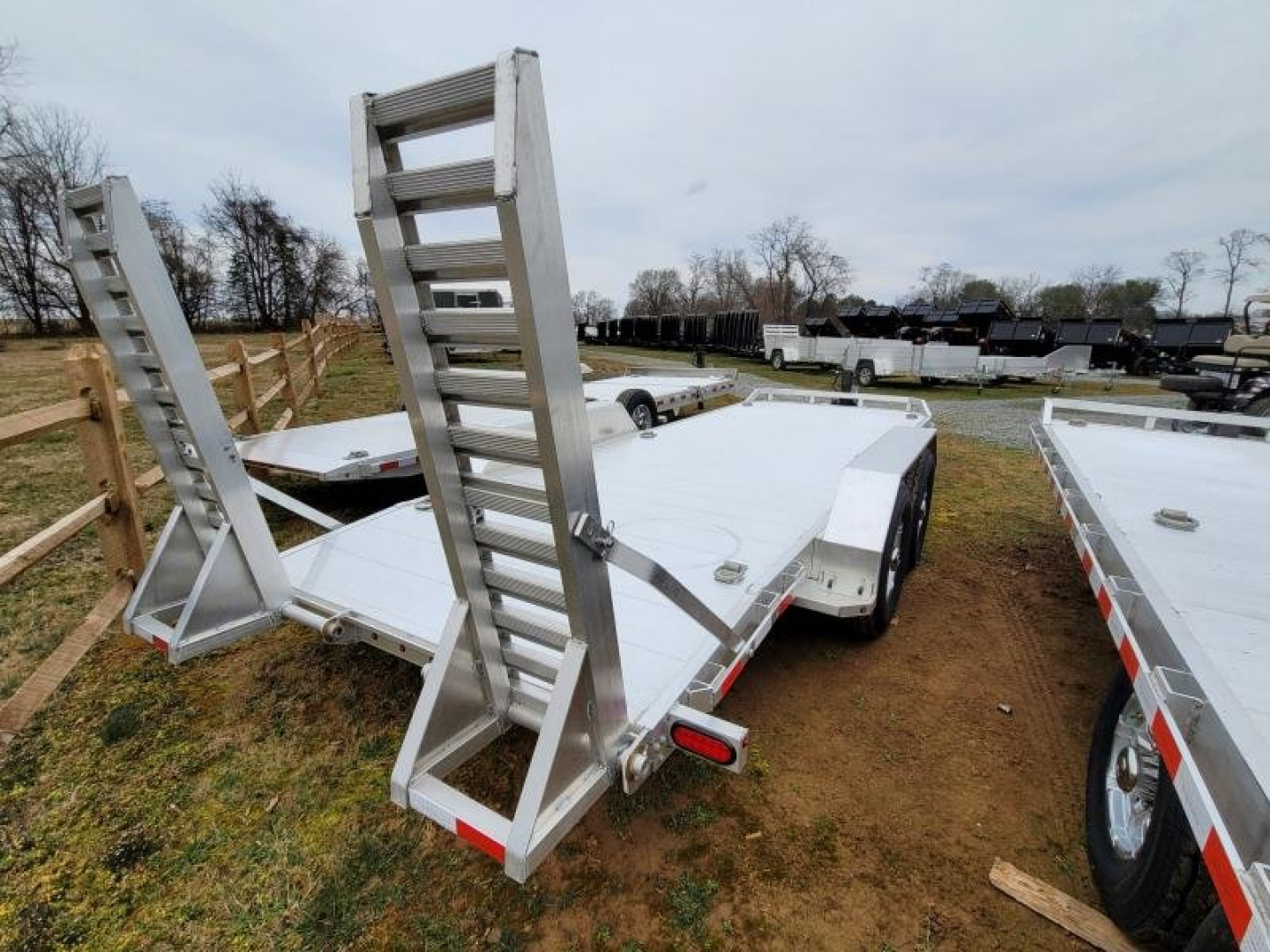 New 2024 Aluma 82x18 SKID STEER Equipment Trailer