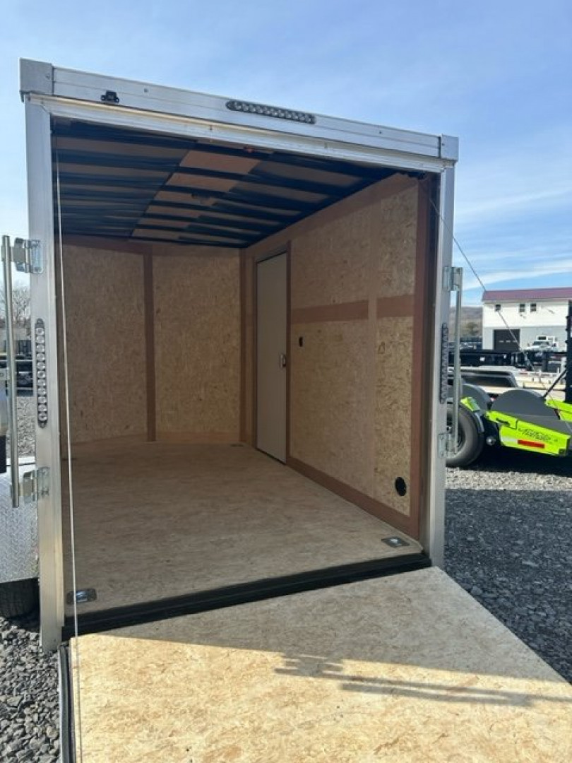 New 2024 Wells Cargo RFV610S2 Cargo / Enclosed Trailer 6'x10' 2990#