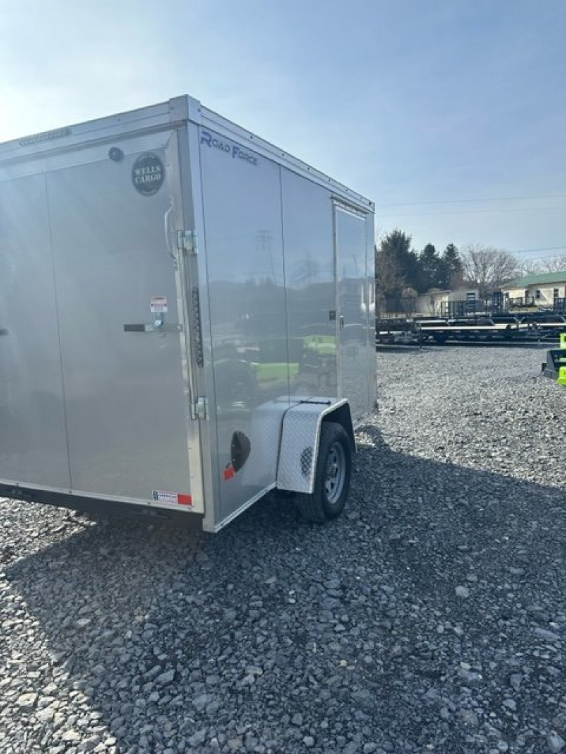 New 2024 Wells Cargo RFV610S2 Cargo / Enclosed Trailer 6'x10' 2990#