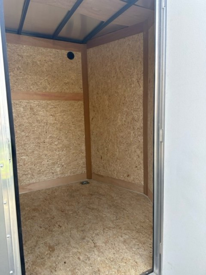 New 2024 Wells Cargo RFV610S2 Cargo / Enclosed Trailer 6'x10' 2990#