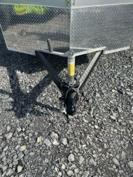 New 2024 Wells Cargo RFV610S2 Cargo / Enclosed Trailer 6'x10' 2990#