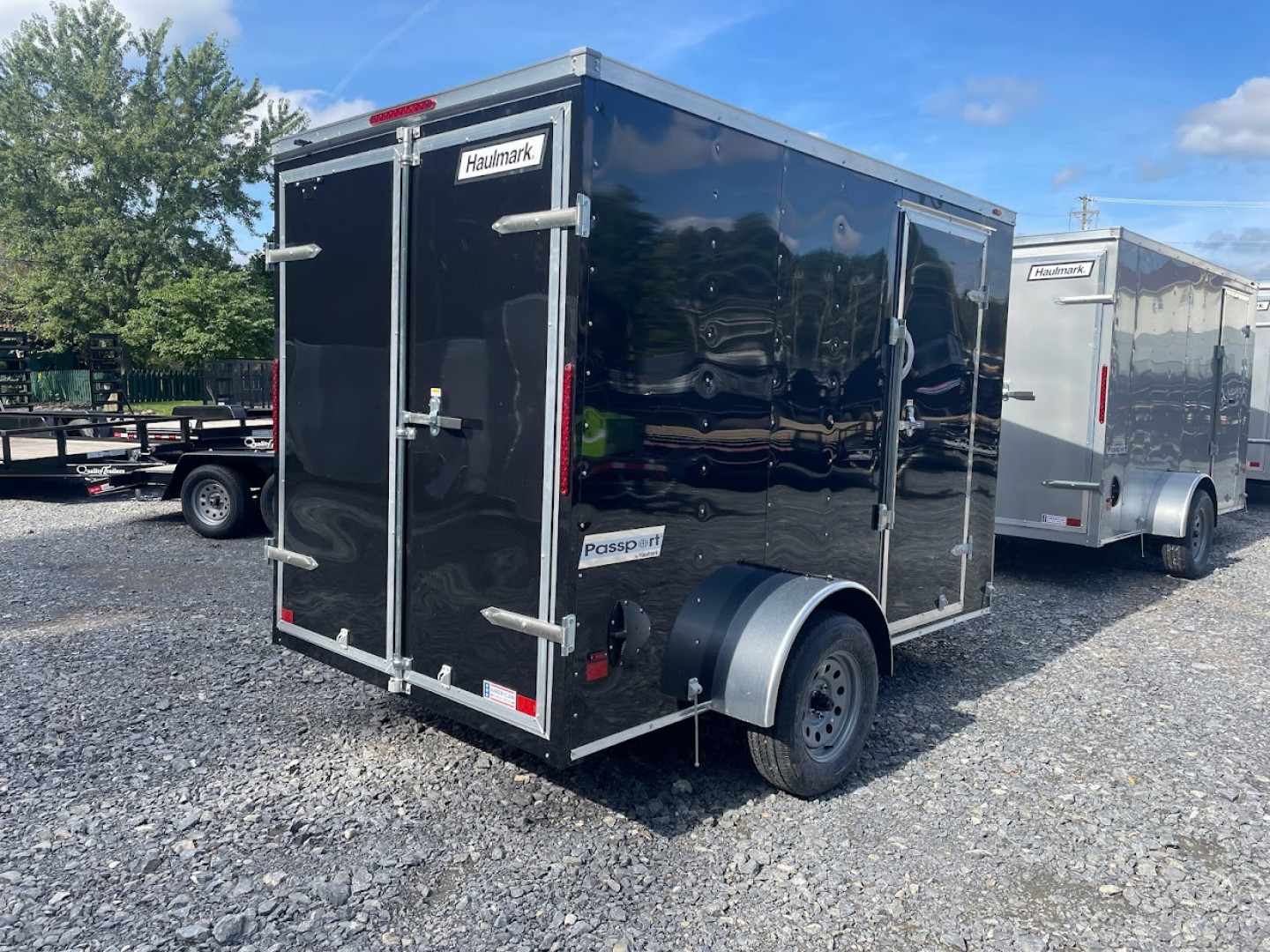 New 2024 Haulmark Passport Deluxe 6x10 Cargo / Enclosed Trailer W/ barn doors